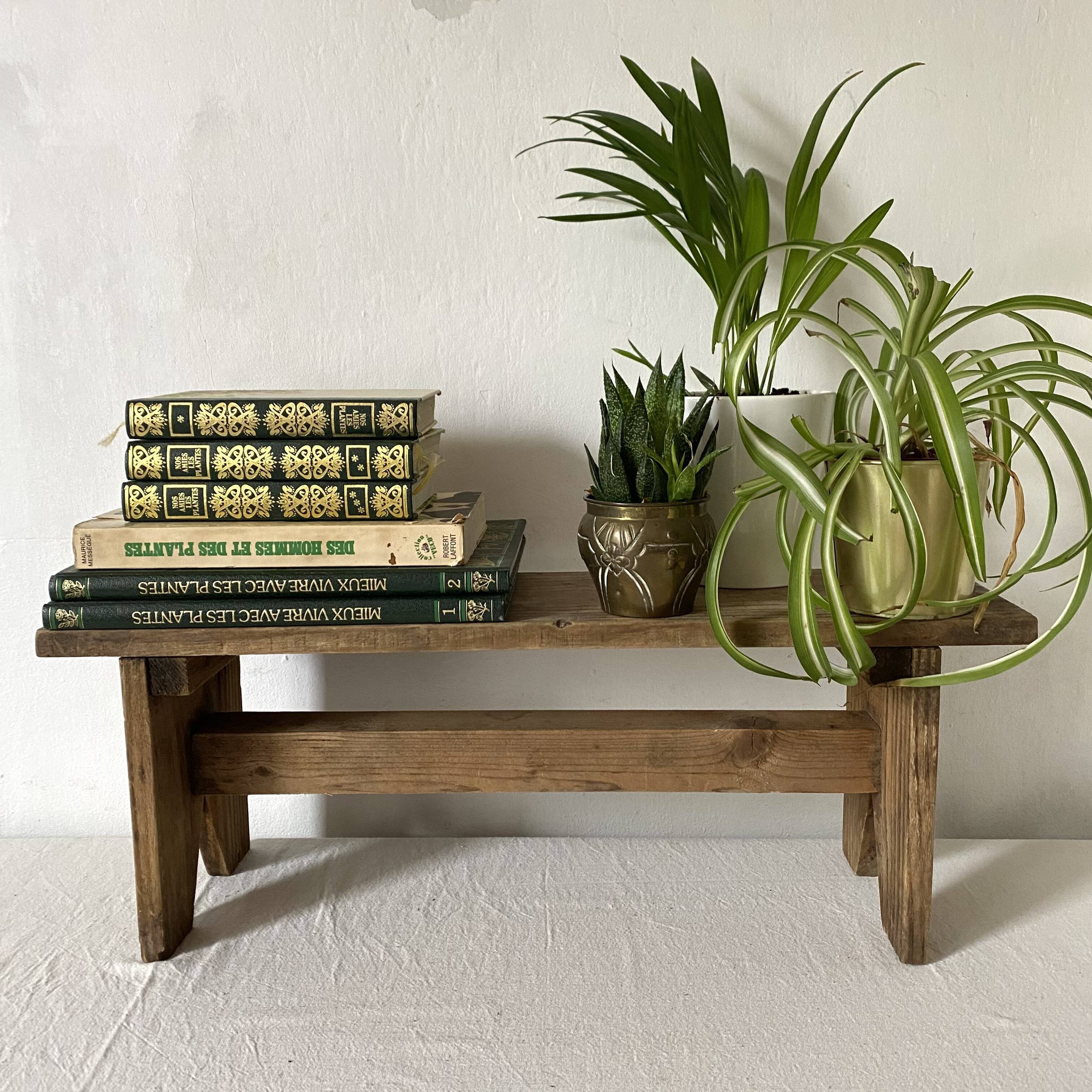 Low stool in raw wood