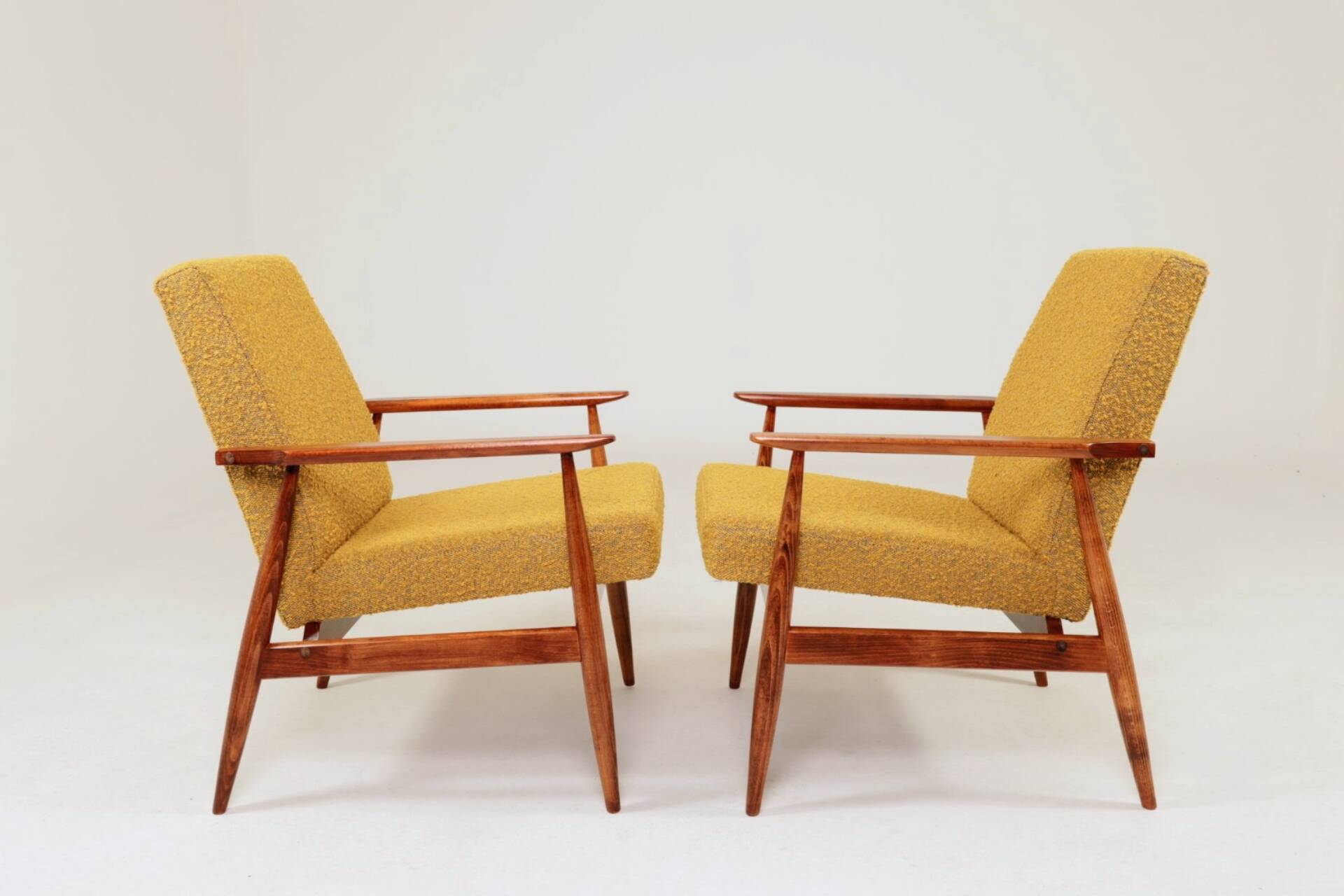 Pair of vintage boucle mustard armchairs H.Lis