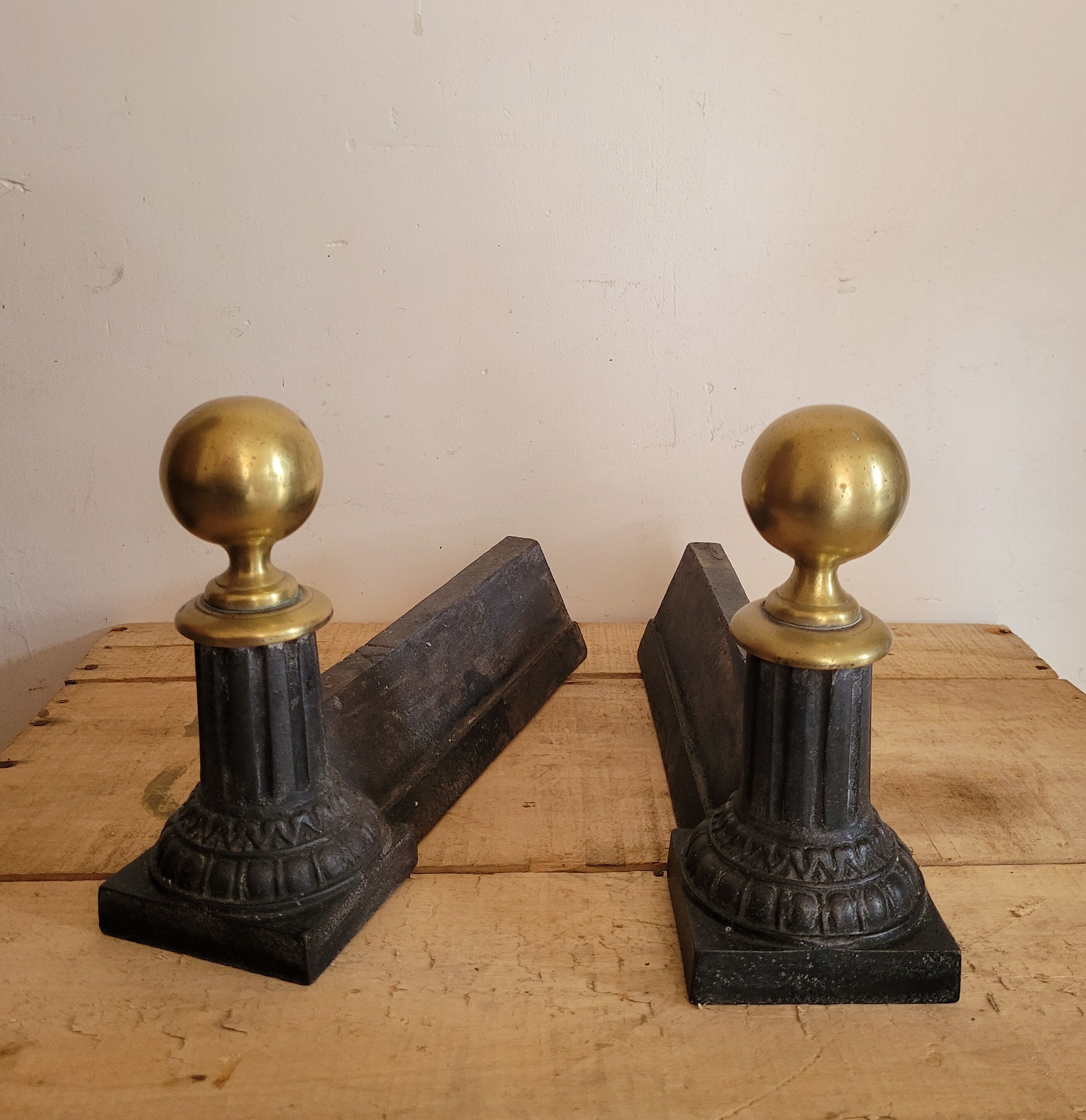 Pair of cast iron and brass chenets