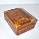 Vintage wooden box with straw marquetry and mother-of-pearl decoration.