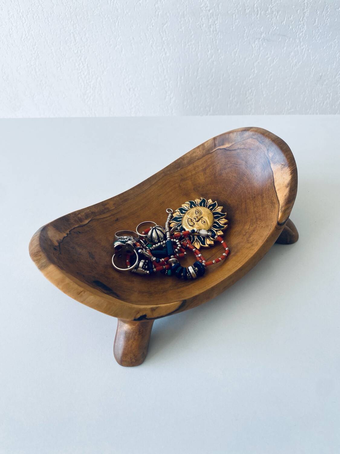 Olive wood pocket emptier