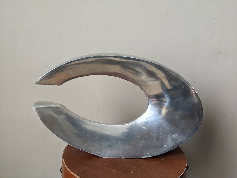 Single-flower vase in cast aluminum, space age design, silver metal