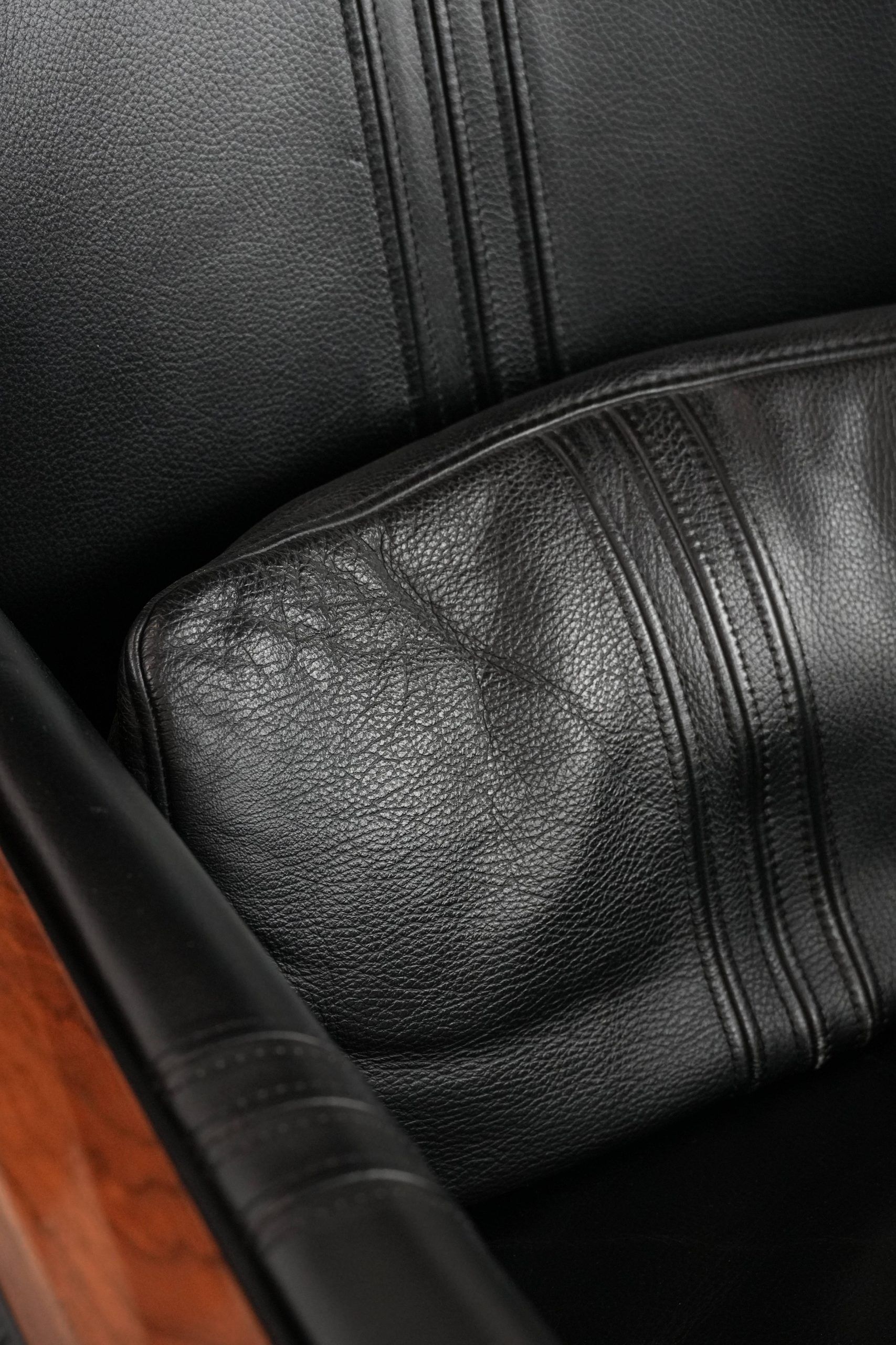 Beautiful and very comfortable black Art Deco design armchair