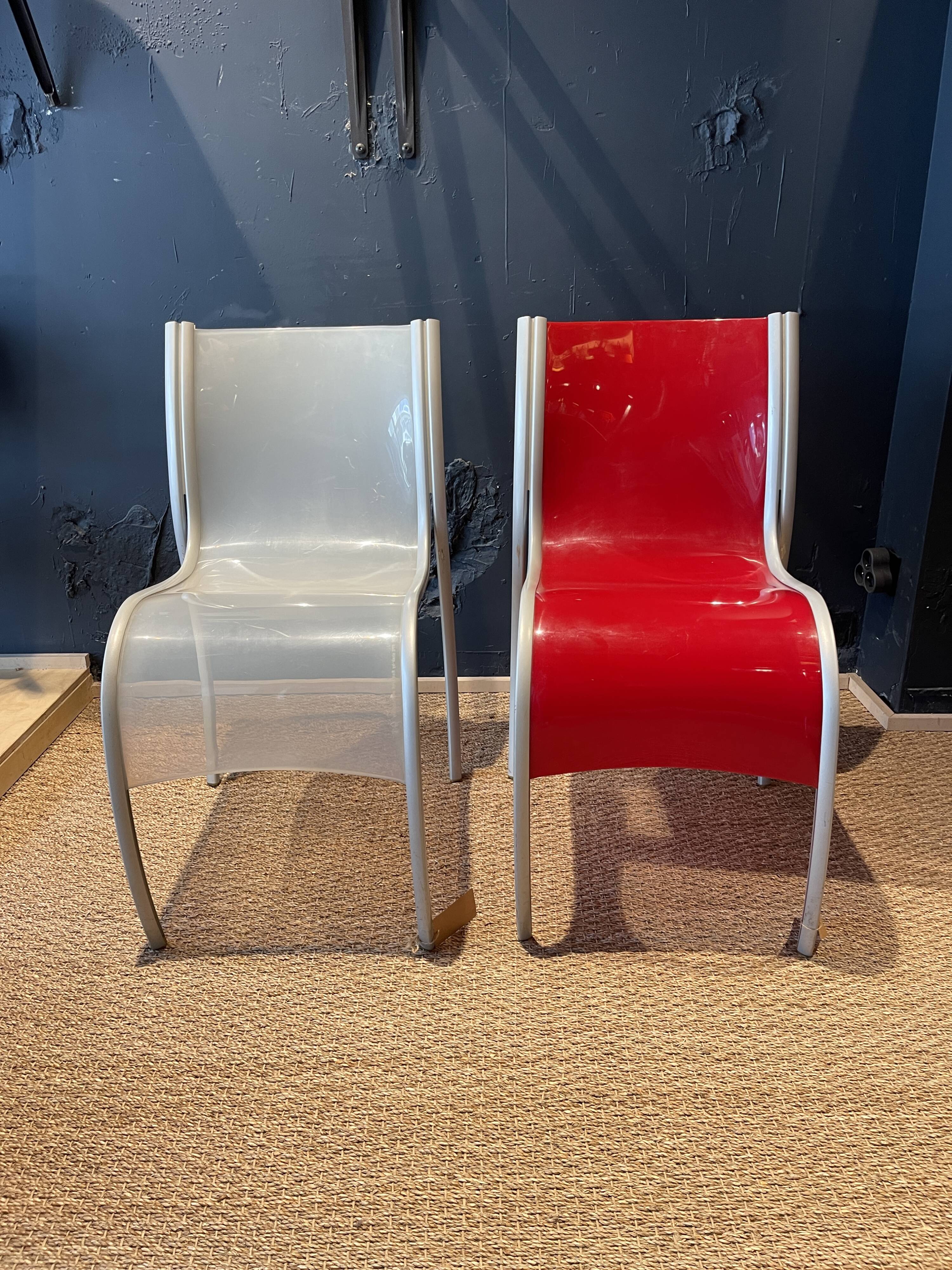 Pair of FPE chairs by Ron Arad for Kartell translucent and red Italy