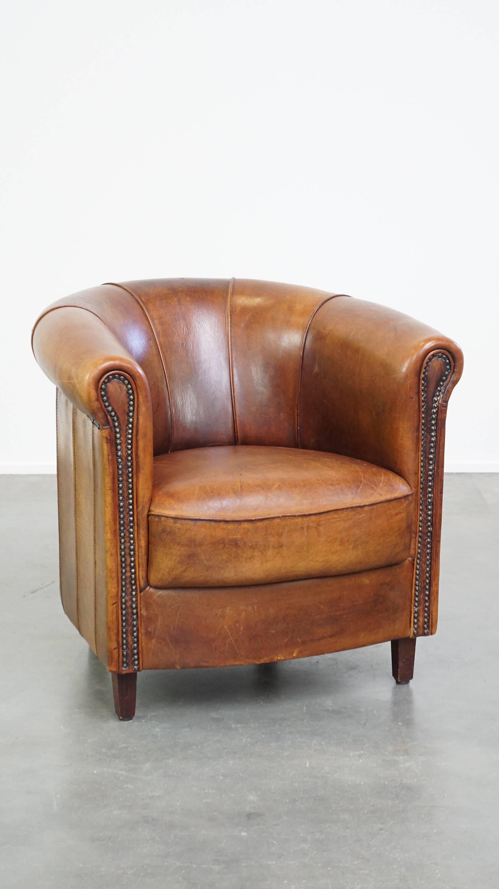 Brown leather club chair