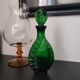 Vintage green carafe in chiseled glass