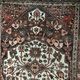 Antique handmade Hamadan Persian rug, ivory medallion on dark background 148x103.