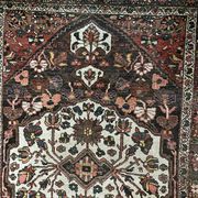 Antique handmade Hamadan Persian rug, ivory medallion on dark background 148x103.