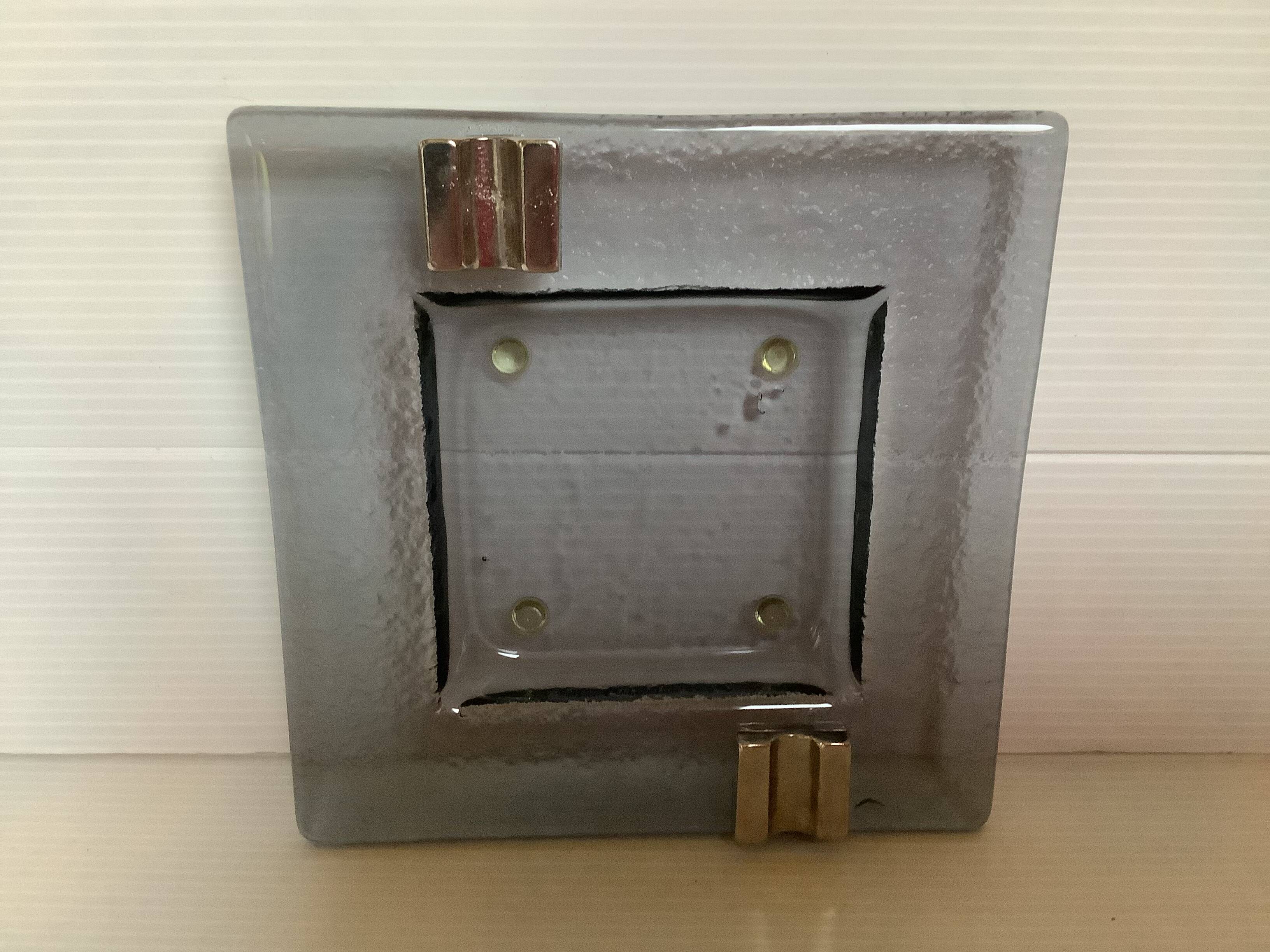 Square ashtray in glass and metal