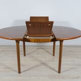 Round extendable dining table from McIntosh, 1960s
