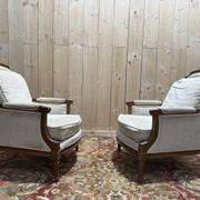 Paire de fauteuil / bergères de style Louis XVI beige