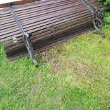Old wooden bench and wrought iron