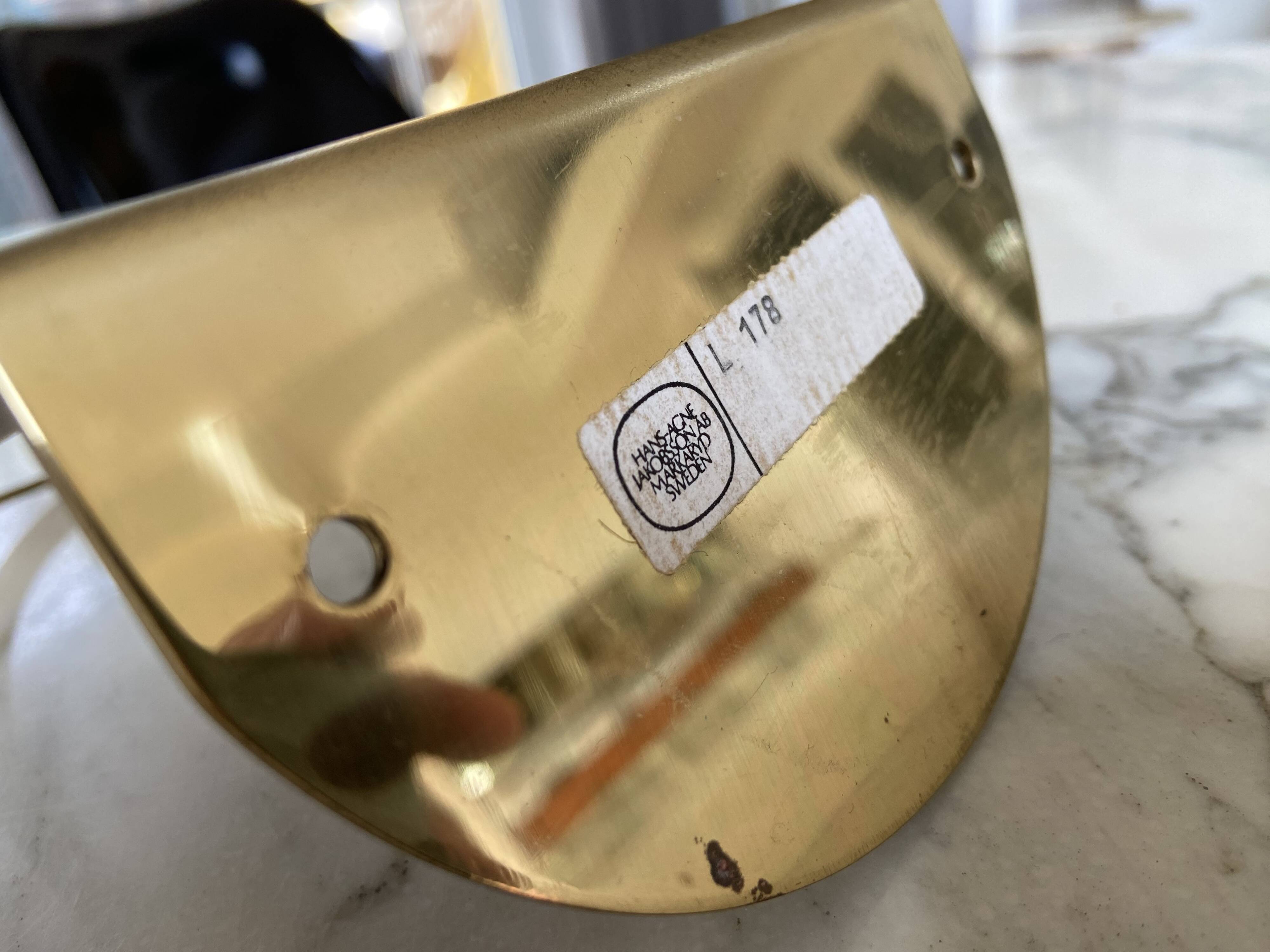 Brass bookends marked Hans-Agne Jakobsson, Sweden, 1960s.