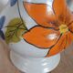 Ceramic vase or pitcher with Poët Laval floral motifs