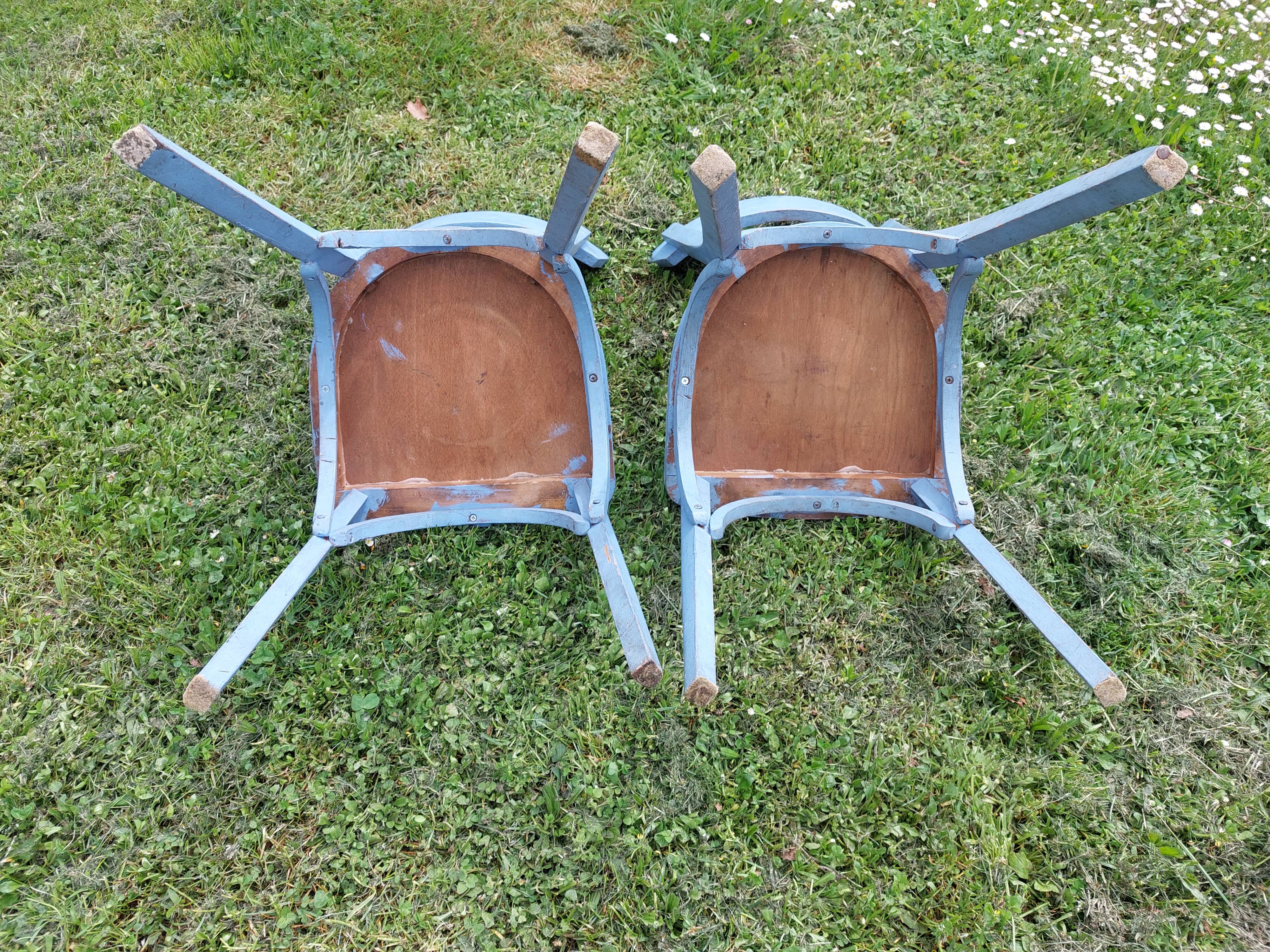 pair of chippy blue paint bistro chairs