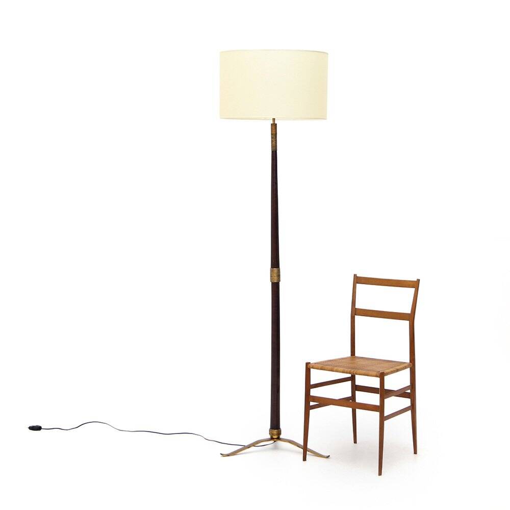 Floor lamp with a brass base and parchment shade, 1940s.