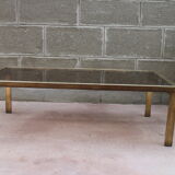 Brass coffee table and 1970 smoked glass