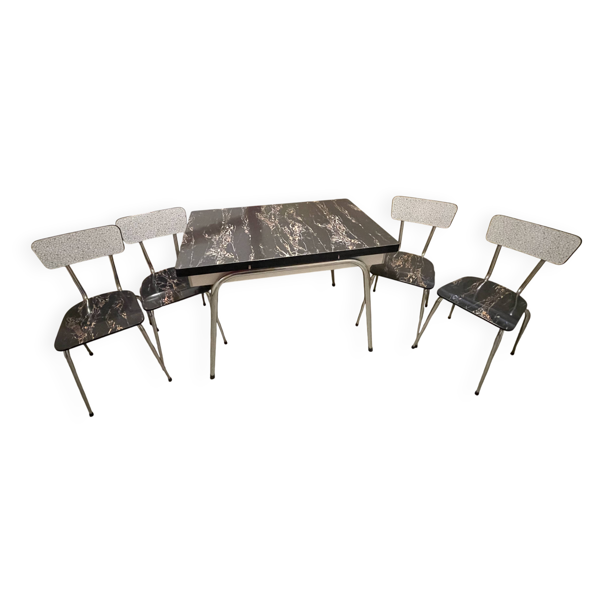 Table and 4 chairs in Formica.