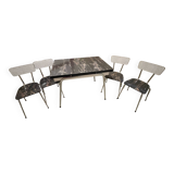 Table and 4 chairs in Formica.