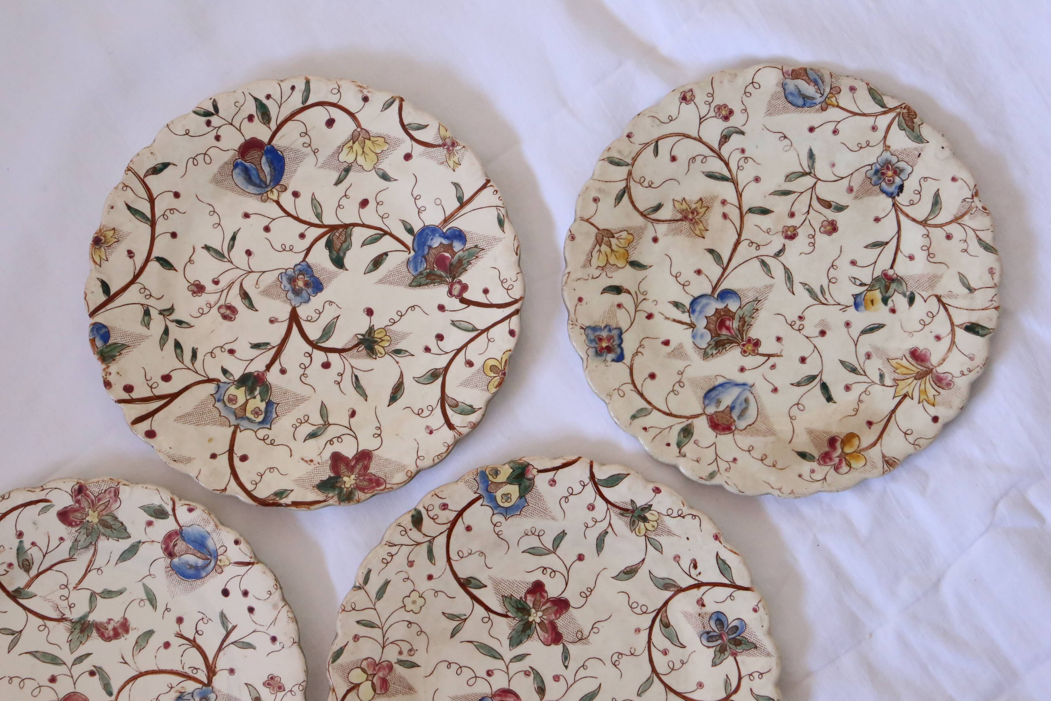 Set of 4 old polychrome plates