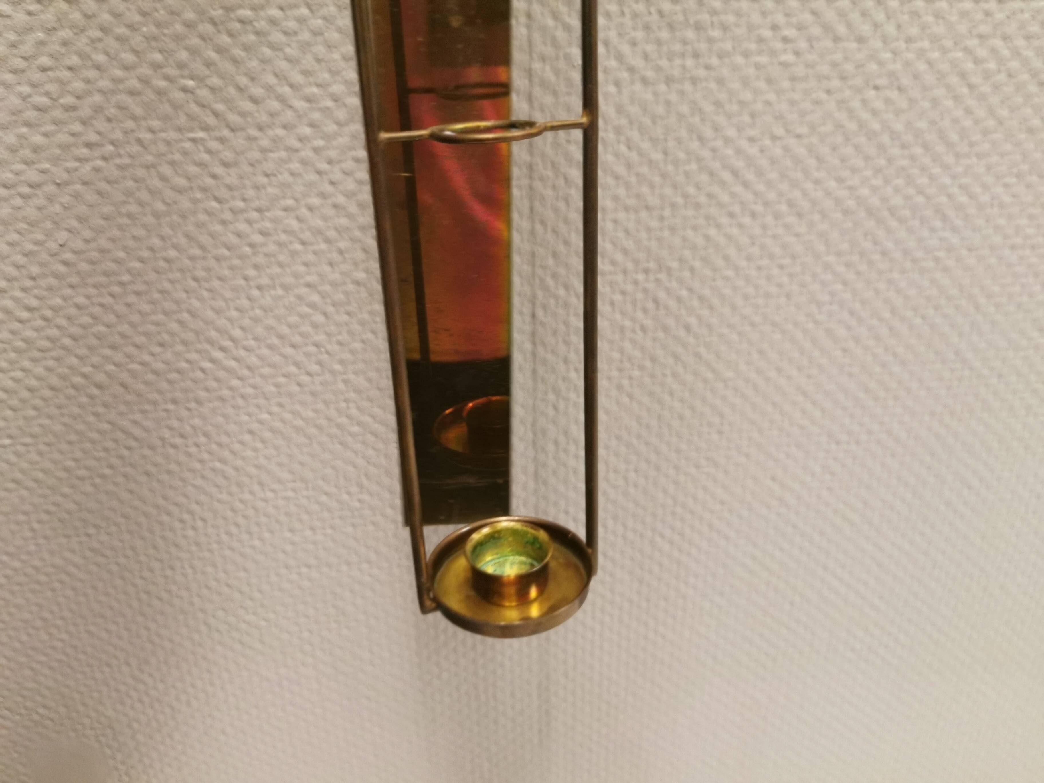Old Wall hung brass candle holder.