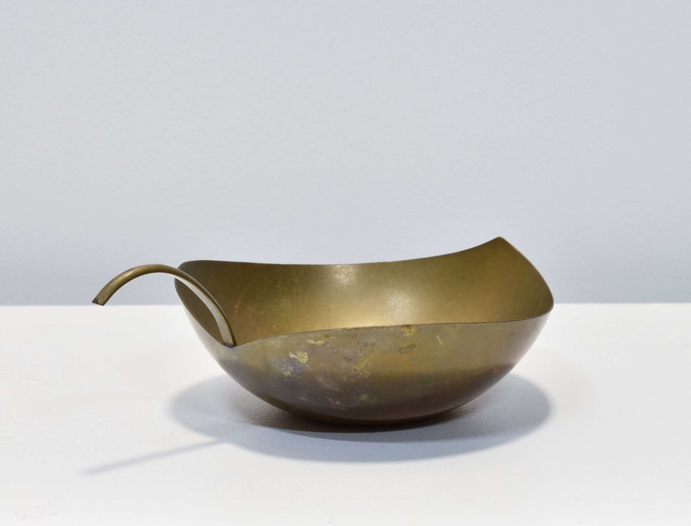 Empty brass leaf pocket