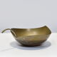 Empty brass leaf pocket
