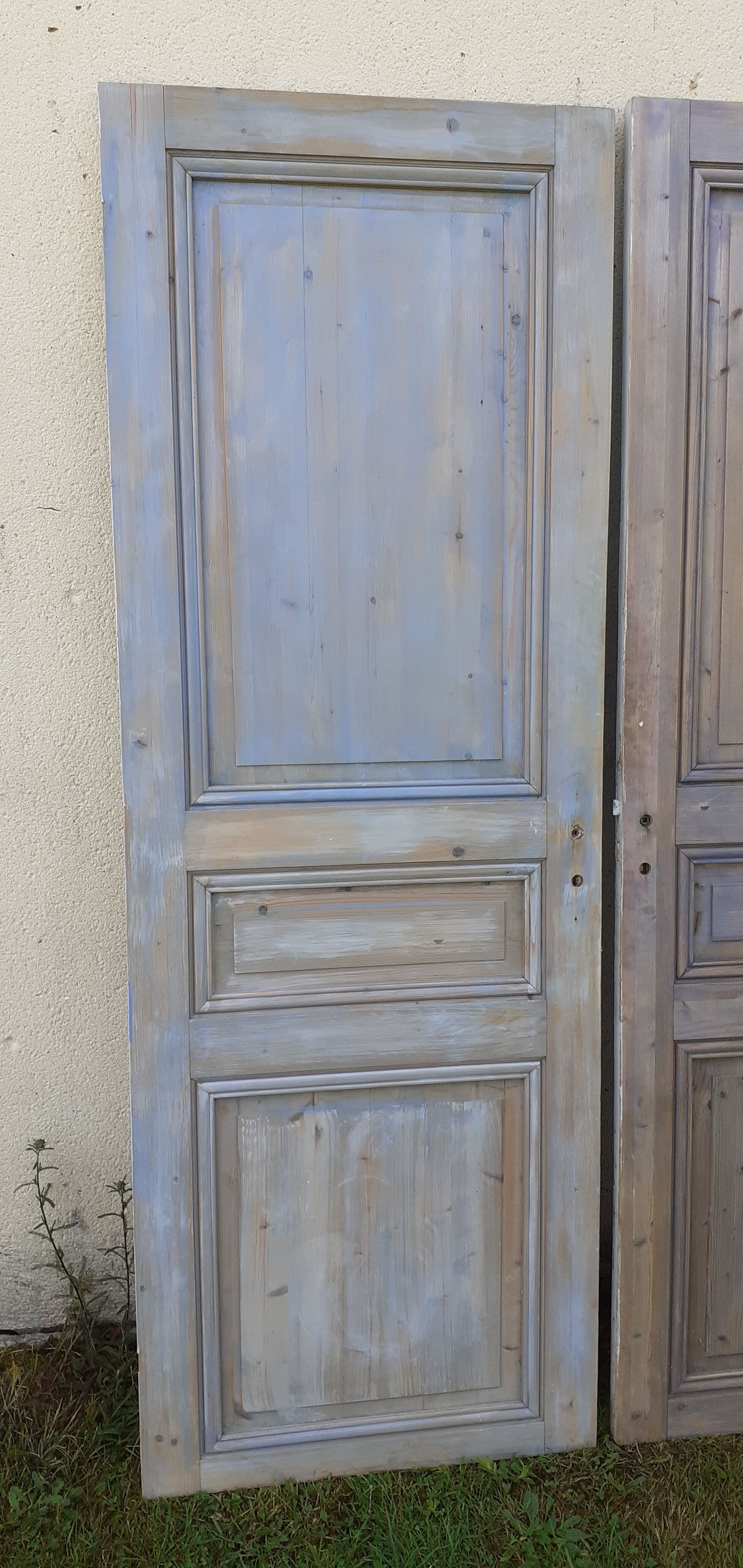 Pairs of Haussmannian doors in patinated aged wood