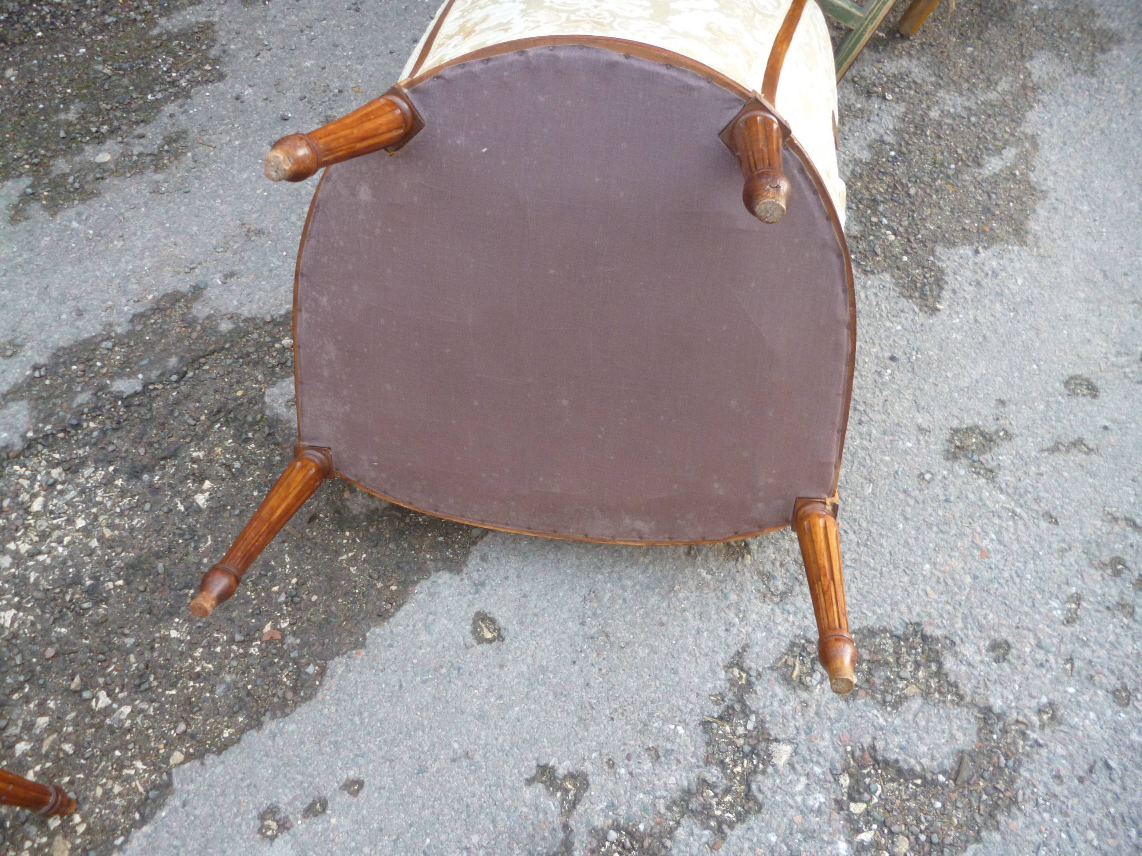 Pair of Louis XVI style armchairs with ears