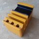 Pencil holder rests phone with waiting music, vintage 70s