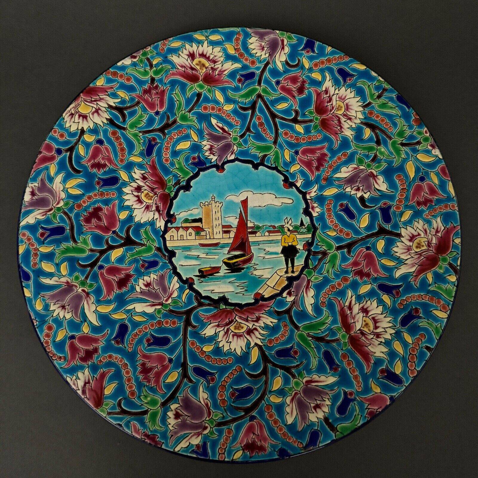 Longwy enamel dish decorated with a port scene
