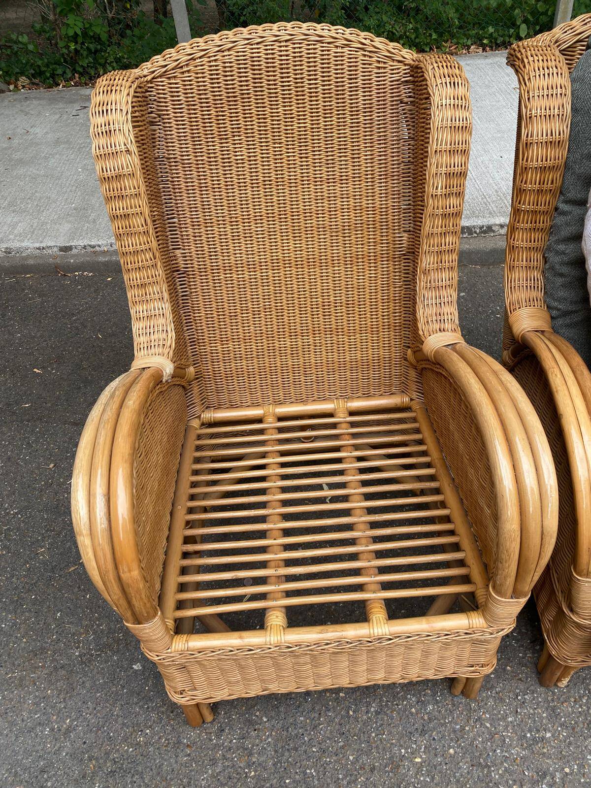 2 rattan and woven wicker armchairs in vintage 70s style
