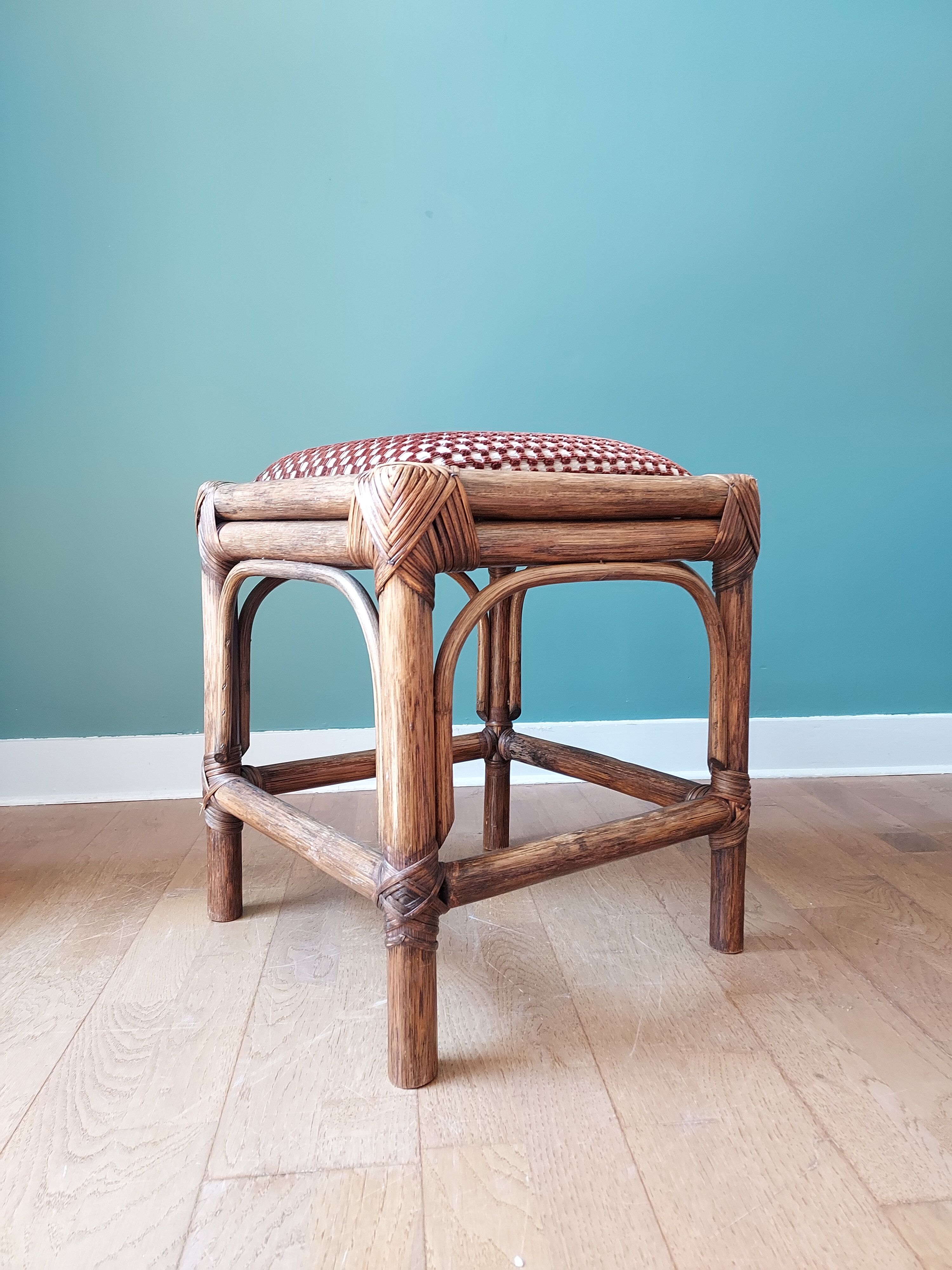 Rattan and velvet stool
