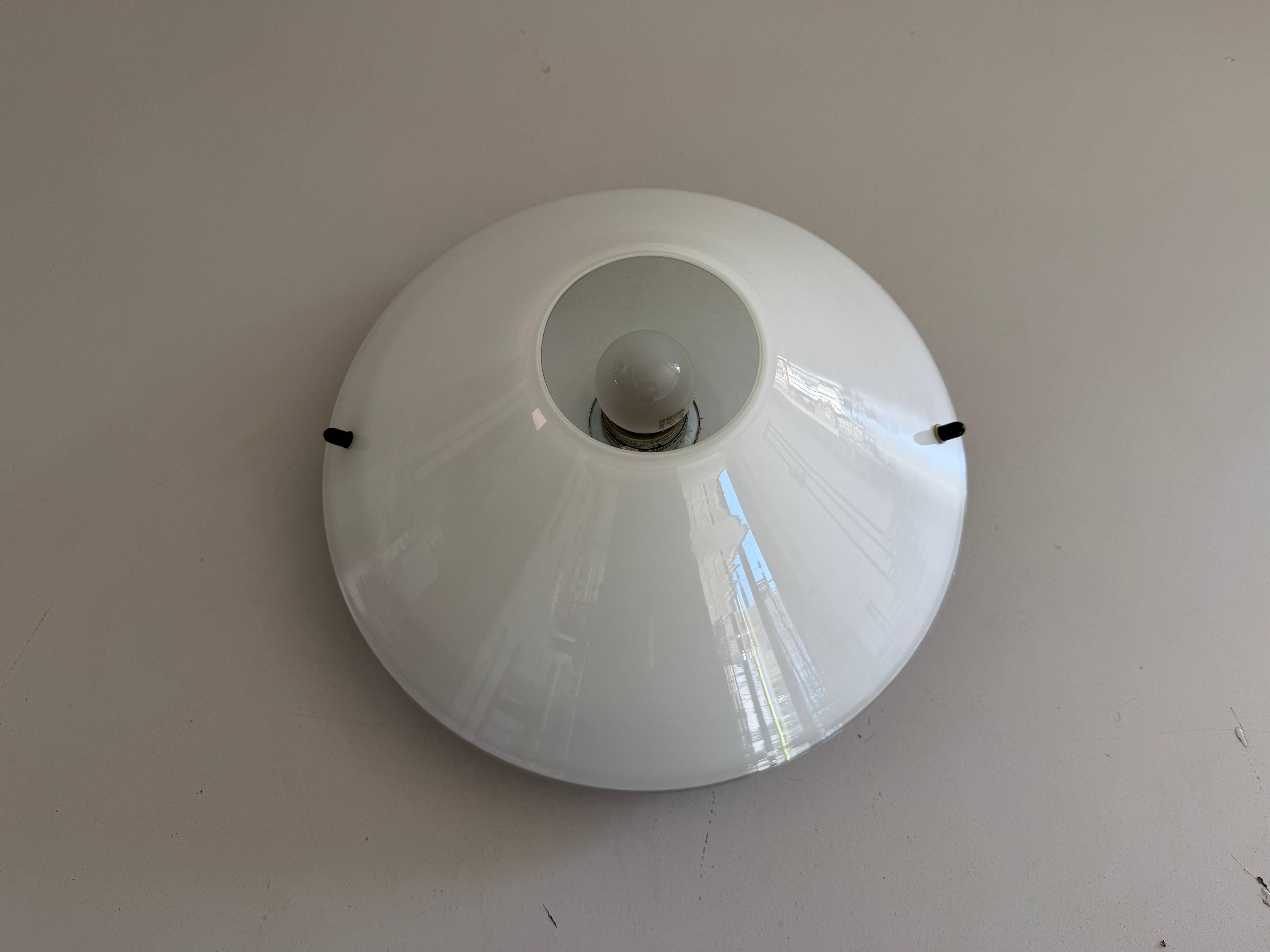 Simple opal glass wall light from the mid-century by Lamperti, 1960s, Italy.