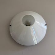 Simple opal glass wall light from the mid-century by Lamperti, 1960s, Italy.