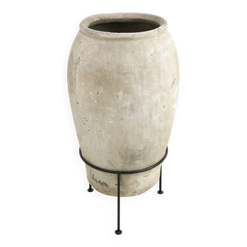 Large terracotta jar on foot
