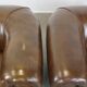 2 Chesterfield armchairs in dark brown cowhide