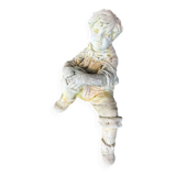 Stone child garden statue