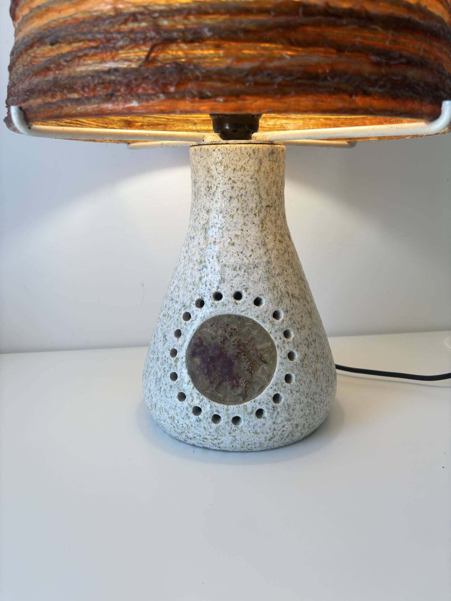 Accolay Lamp, the base in glazed ceramic with openwork decoration.