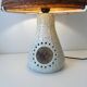 Accolay Lamp, the base in glazed ceramic with openwork decoration.