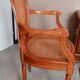 Antique Louis XVI style cane armchair
