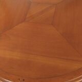 Round cherry wood table with extensions