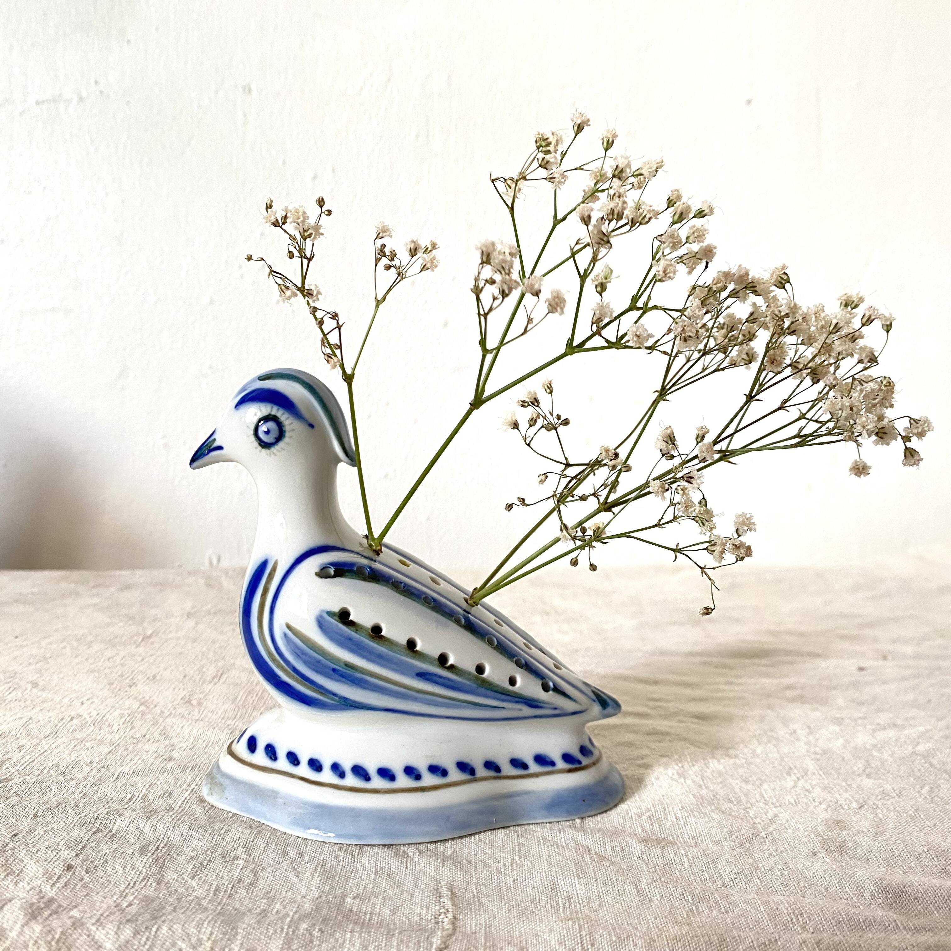 Porcelain bird, flower vase