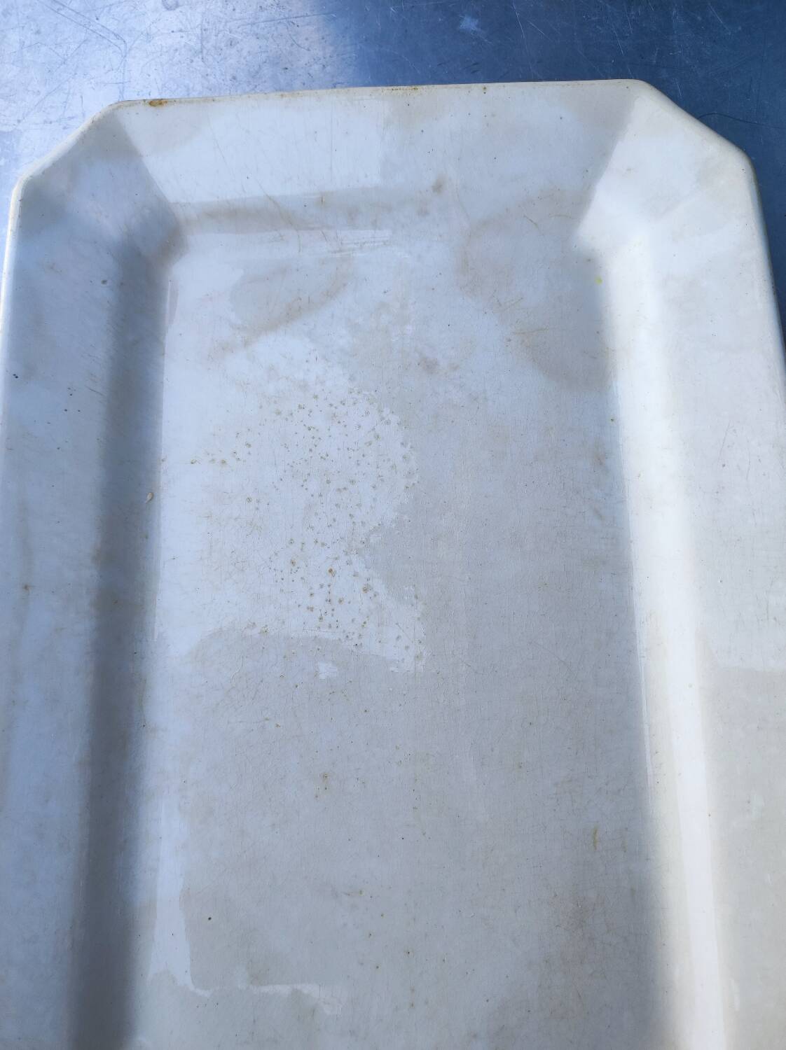 2 old earthenware dishes, one from Gien