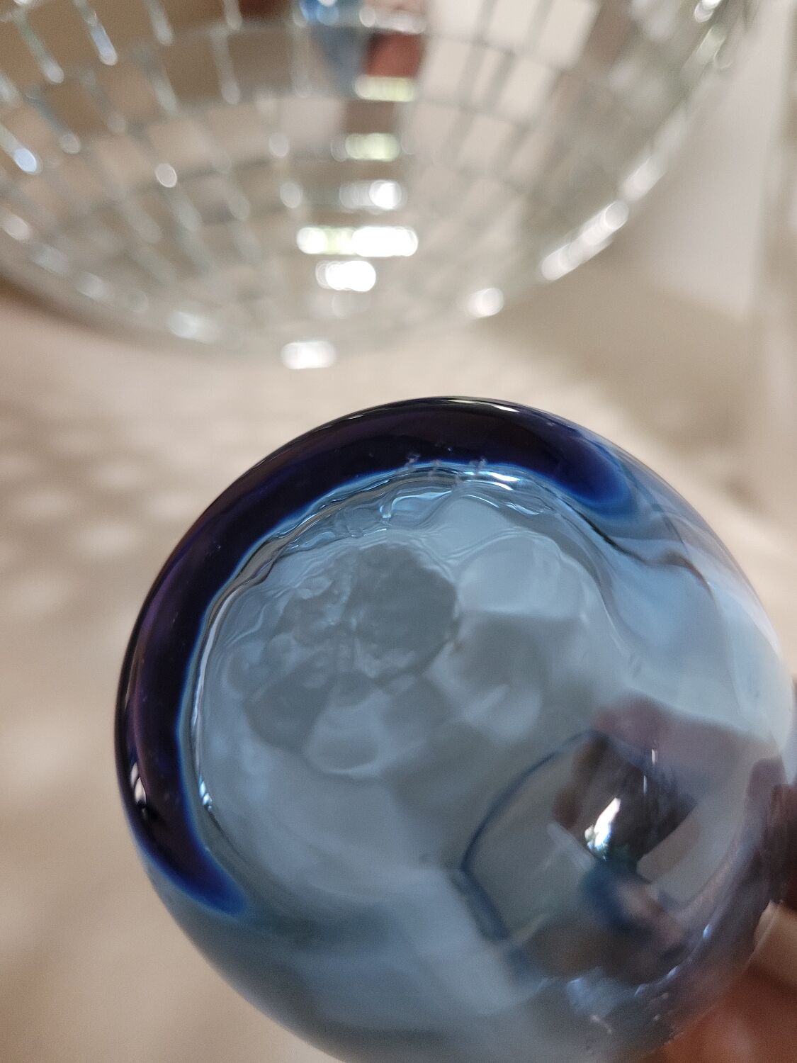 Small blown blue glass bottle