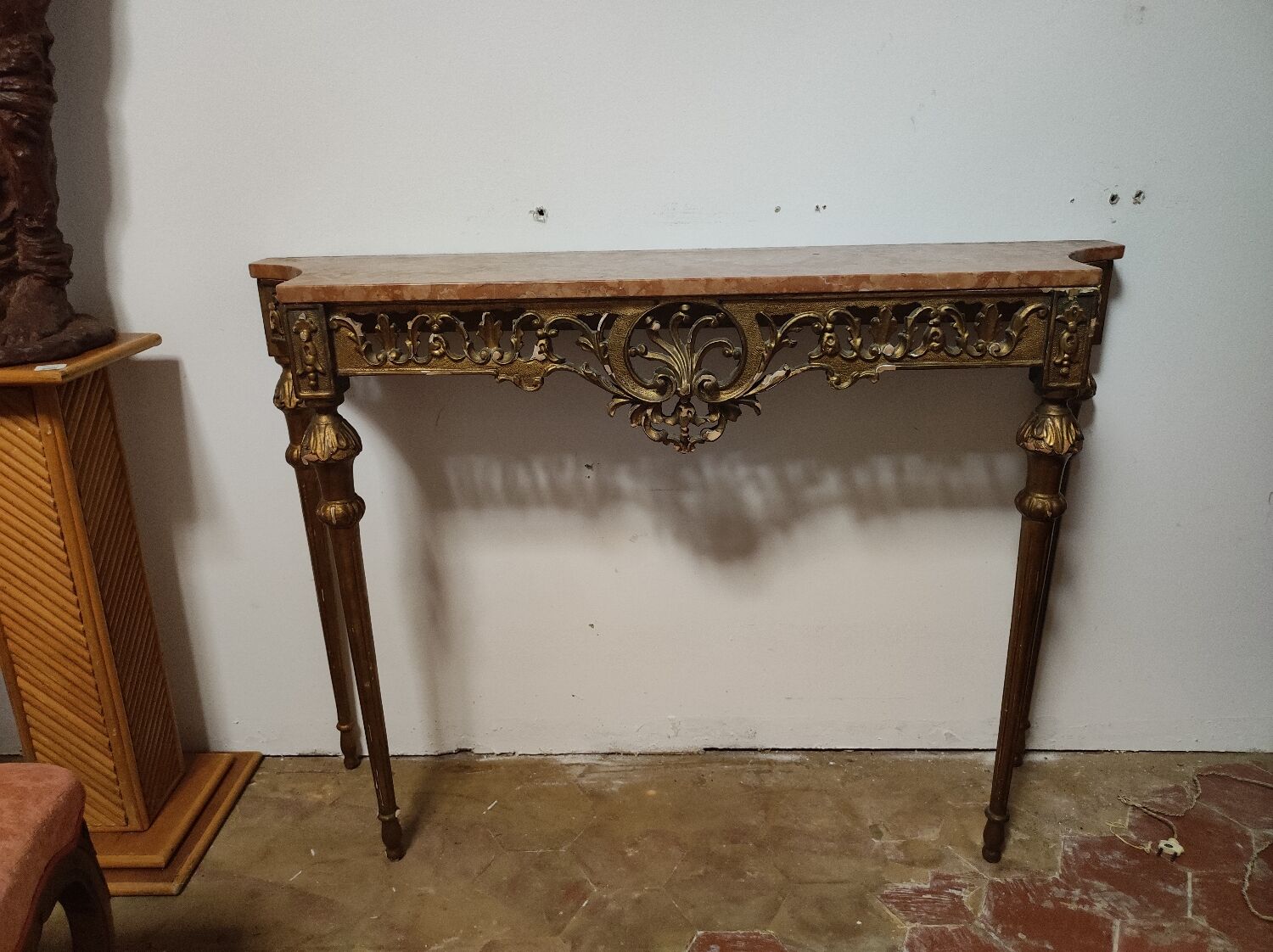 Console in gilded wood and red marble from the 1920s