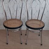 Pair of chrome and cane bistro chairs from the 70s.