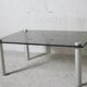 Coffee table cylindrical footings, tray smoked glass, circa 1970