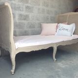 Carved wooden bench and caning bed