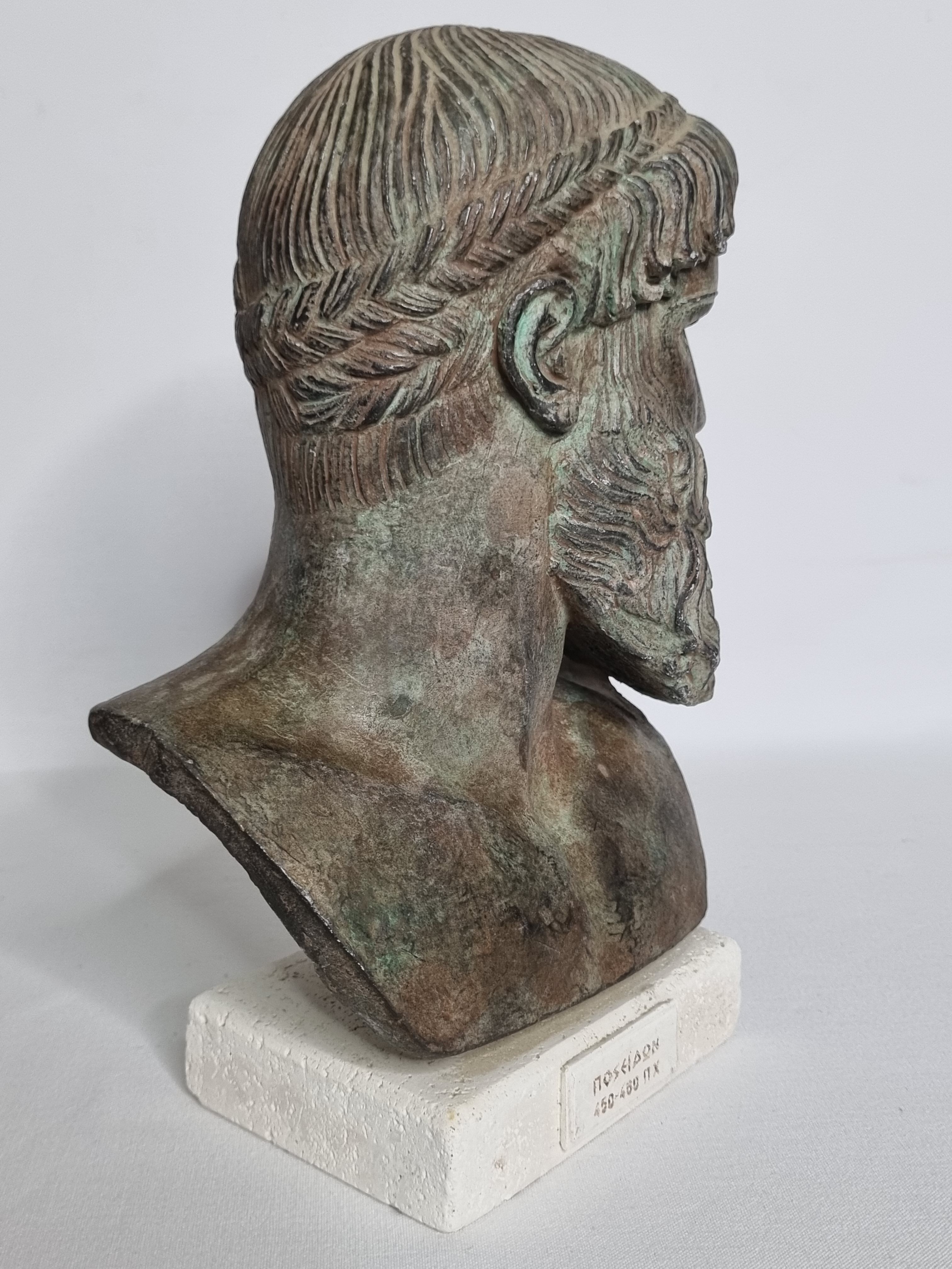 Bust of Poseidon in patinated plaster on plaster base,